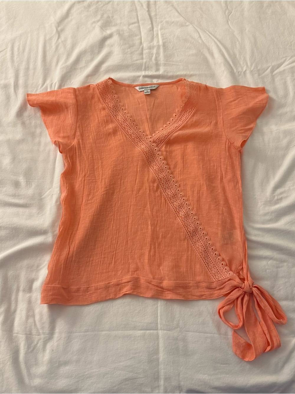 Women's Counterpart blouse with tie detail, size Small